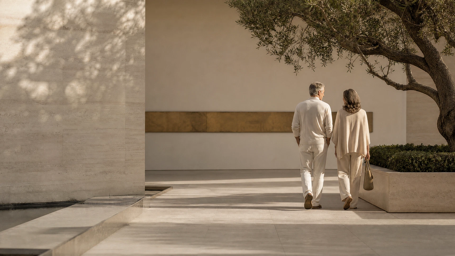 People moving through a quiet outdoor space
